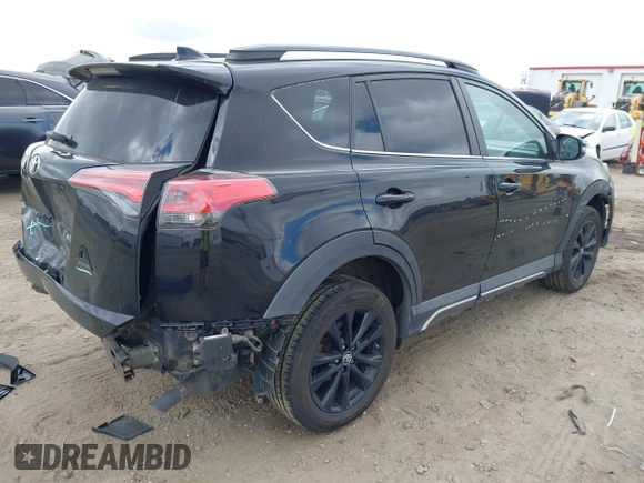 2018 Toyota RAV4 XLE with VIN 2T3RFREV1JW697044, listed as a IAAI auction lot 41891412 with 140,145 mi miles. Bid and sale history available at carsss.com. Image 4.
