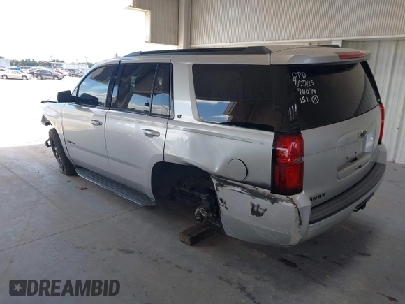 2019 Chevrolet Tahoe LT with VIN 1GNSCBKC0KR240660, listed as a IAAI auction lot 42265044 with 109,720 mi miles and . Bid and sale history available at DreamBid. Image 3.