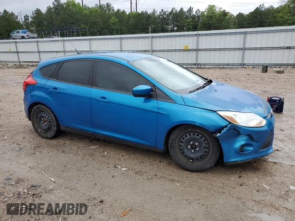 2012 Ford Focus SE z VIN 1FAHP3K22CL413920, wystawiony jako Copart lot #57769615 z przebiegiem 200 728 mil mil oraz Szkoda całkowita • Salvage title. Historia ofert i sprzedaży dostępna na DreamBid. Obrazek 4.