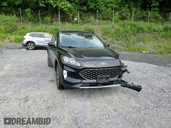 2020 Ford Escape Titanium с VIN 1FMCU9J97LUA20595, выставлен на аукционе Copart как лот 59476745 с пробегом 74 518 миль миль и Списание • Salvage title. История ставок и продаж доступна на DreamBid. Изображение 14.