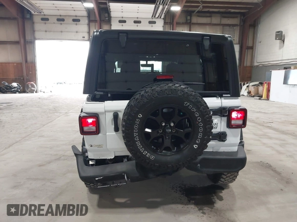 2023 Jeep Wrangler Sport S with VIN 1C4HJXDN2PW632584, listed as a IAAI auction lot 41965191 with 20,288 mi miles and . Bid and sale history available at DreamBid. Image 18.