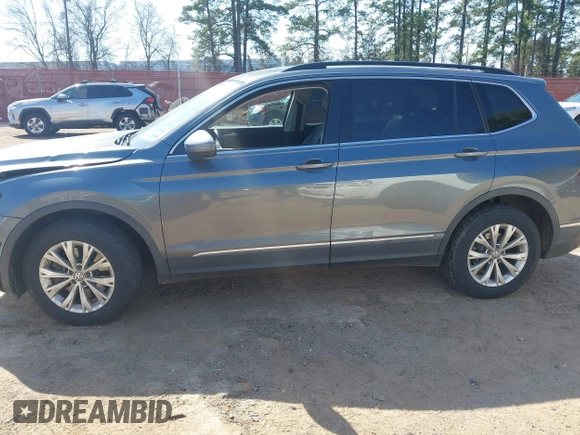 2018 Volkswagen Tiguan SEL with VIN 3VV3B7AX6JM001231, listed as a IAAI auction lot 41781659 with 137,930 mi miles and . Bid and sale history available at DreamBid. Image 14.