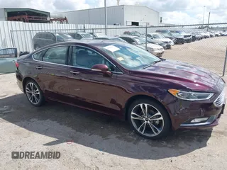 2017 Ford Fusion Titanium with VIN 3FA6P0K97HR214485, listed as a IAAI auction lot 40208619 with 39,265 mi miles and . Bid and sale history available at DreamBid. Image 13.