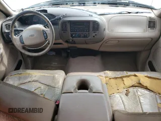 1999 Ford F-150 z VIN 1FTRX07W6XKA48100, wystawiony jako Copart lot #73209844 z przebiegiem Nie podano mil oraz Szkoda całkowita • Salvage title. Historia ofert i sprzedaży dostępna na DreamBid. Obrazek 8.