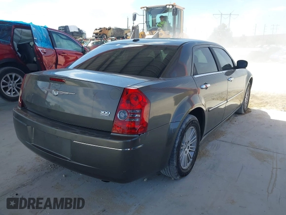 2010 Chrysler 300 Touring with VIN 2C3CA5CV5AH233033, listed as a IAAI auction lot 42130676 with 158,323 mi miles and . Bid and sale history available at DreamBid. Image 4.