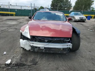 2013 Nissan 370Z Touring z VIN JN1AZ4EH9DM381350, wystawiony jako Copart lot #59375295 z przebiegiem 100 832 mil mil oraz Czysty tytuł • Clean title. Historia ofert i sprzedaży dostępna na DreamBid. Obrazek 5.