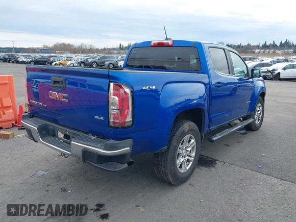 2019 GMC Canyon 4WD SLE with VIN 1GTG6CEN6K1304918, listed as a IAAI auction lot 41624468 with 102,579 mi miles. Bid and sale history available at carsss.com. Image 4.