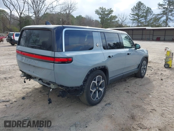 2024 Rivian R1S Adventure with VIN 7PDSGBBA1RN040036, listed as a IAAI auction lot 41694635 with 13,855 mi miles. Bid and sale history available at carsss.com. Image 4.