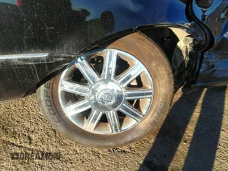 2006 Cadillac DTS w/1SC with VIN 1G6KD57Y06U177772, listed as a IAAI auction lot 41814013 with 190,076 mi miles. Bid and sale history available at carsss.com. Image 6.