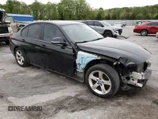 2015 BMW 3 Series 328i with VIN WBA3C1C58FK120706, listed as a Copart auction lot 54318135 with 119,988 mi miles and Salvage title. Bid and sale history available at DreamBid. Image 4.