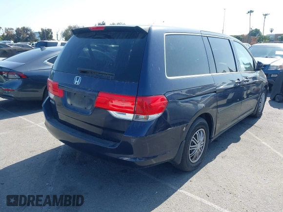 2008 Honda Odyssey LX with VIN 5FNRL38268B025424, listed as a IAAI auction lot 42432326 with 210,644 mi miles and . Bid and sale history available at DreamBid. Image 4.