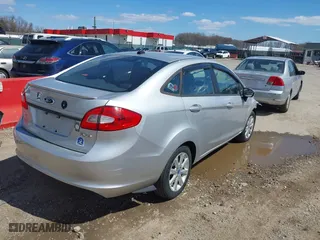 2013 Ford Fiesta SE with VIN 3FADP4BJ2DM173456, listed as a IAAI auction lot 41785902 with 87,004 mi miles. Bid and sale history available at carsss.com. Image 4.
