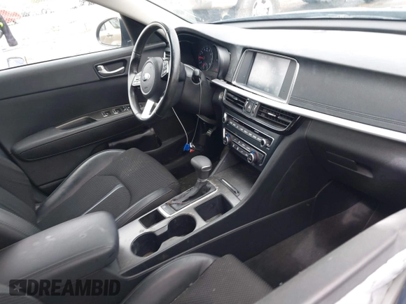 2019 Kia Optima LX with VIN 5XXGT4L37KG361486, listed as a IAAI auction lot 41601404 with 56,891 mi miles. Bid and sale history available at carsss.com. Image 5.