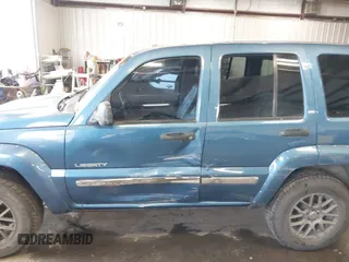 2004 Jeep Liberty Limited with VIN 1J4GK58K84W226666, listed as a IAAI auction lot 41764238 with 148,664 mi miles. Bid and sale history available at carsss.com. Image 14.