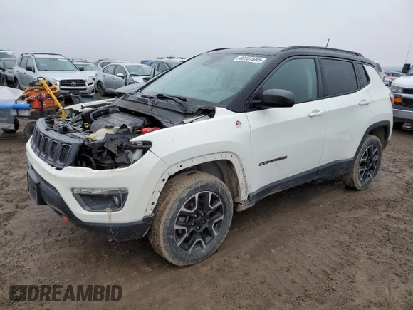 2021 Jeep Compass Trailhawk with VIN 3C4NJDDB5MT590369, listed as a Copart auction lot 46107685 with 67,857 mi miles and Salvage title. Bid and sale history available at DreamBid. Image 1.