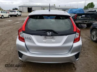 2016 Honda Fit LX с VIN JHMGK5H58GX003511, выставлен на аукционе Copart как лот 58022235 с пробегом Не указан миль и Чистый • Clean title. История ставок и продаж доступна на DreamBid. Изображение 6.