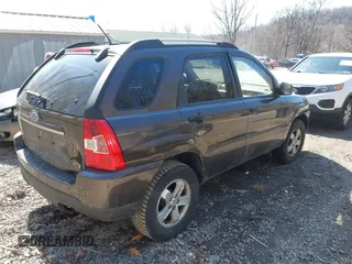2010 Kia Sportage LX with VIN KNDKGCA32A7669068, listed as a IAAI auction lot 41783154 with 168,226 mi miles and . Bid and sale history available at carsss.com. Image 4.