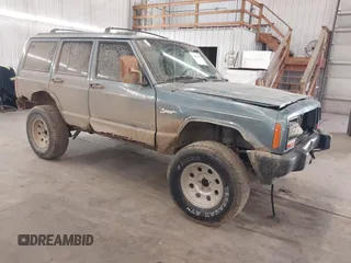 1998 Jeep Cherokee Sport with VIN 1J4FJ68S5WL284937, listed as a IAAI auction lot 41984490 with 259,716 mi miles and . Bid and sale history available at DreamBid. Image 1.