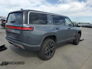 2023 Rivian R1S Adventure z VIN 7PDSGABA5PN010593, wystawiony jako Copart lot #52508835 z przebiegiem 16 962 mil mil oraz Szkody całkowita. Historia ofert i sprzedaży dostępna na DreamBid. Obrazek 3.