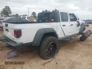 2020 Jeep Gladiator Sport S с VIN 1C6JJTAG1LL204637, выставлен на аукционе IAAI как лот 41743343 с пробегом 94 305 миль миль и . История ставок и продаж доступна на DreamBid. Изображение 4.