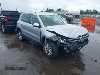 2017 Volkswagen Tiguan Wolfsburg Edition with VIN WVGSV7AX4HK011237, listed as a IAAI auction lot 42607325 with 119,653 mi miles and . Bid and sale history available at DreamBid. Image 1.