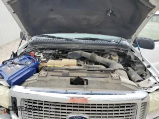 2002 Ford Excursion Special Serv z VIN 1FMNU40L62EB97141, wystawiony jako Copart lot #69656934 z przebiegiem 140 788 mil mil oraz Szkoda całkowita • Salvage title. Historia ofert i sprzedaży dostępna na DreamBid. Obrazek 12.