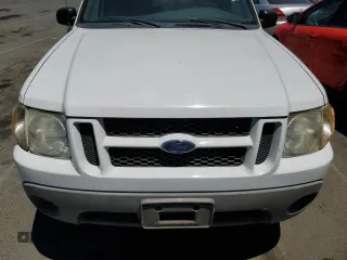 2001 Ford Explorer Sport z VIN 1FMYU60E41UA39699, wystawiony jako Copart lot #62336524 z przebiegiem 223 772 mil mil oraz Szkody całkowita. Historia ofert i sprzedaży dostępna na DreamBid. Obrazek 11.