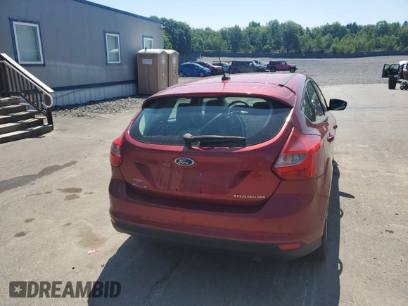 2014 Ford Focus Titanium z VIN 1FADP3N29EL409568, wystawiony jako Copart lot #62295345 z przebiegiem 53 401 mil mil oraz Szkoda całkowita • Salvage title. Historia ofert i sprzedaży dostępna na DreamBid. Obrazek 6.