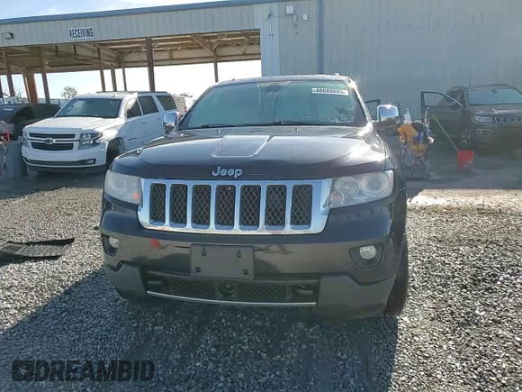 2013 Jeep Grand Cherokee Overland with VIN 1C4RJFCG2DC653207, listed as a Copart auction lot 48680885 with 276,020 mi miles and Salvage Title. Bid and sale history available at carsss.com. Image 14.