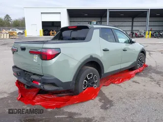 2022 Hyundai Santa Cruz SEL z VIN 5NTJCDAE3NH038055, wystawiony jako IAAI lot #40803108 z przebiegiem 24 208 mil mil oraz . Historia ofert i sprzedaży dostępna na DreamBid. Obrazek 4.