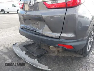 2018 Honda CR-V LX with VIN 2HKRW5H36JH426040, listed as a IAAI auction lot 42031936 with 94,564 mi miles. Bid and sale history available at carsss.com. Image 6.