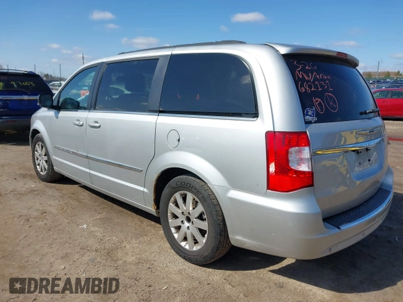 2011 Chrysler Town & Country Touring L with VIN 2A4RR8DG6BR682131, listed as a IAAI auction lot 41897000 with 137,673 mi miles and . Bid and sale history available at DreamBid. Image 3.
