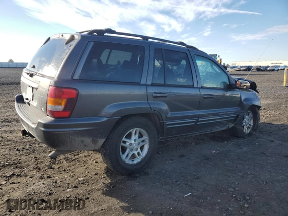 2003 Jeep Grand Cherokee Limited z VIN 1J8GW58N73C502929, wystawiony jako Copart lot #79472734 z przebiegiem 231 176 mil mil oraz Szkoda całkowita • Salvage title. Historia ofert i sprzedaży dostępna na DreamBid. Obrazek 3.