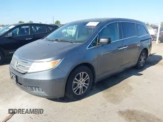 2012 Honda Odyssey EX-L with VIN 5FNRL5H6XCB061026, listed as a IAAI auction lot 42574612 with 144,480 mi miles and . Bid and sale history available at DreamBid. Image 17.