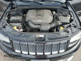2015 Jeep Grand Cherokee Summit with VIN 1C4RJFJG2FC913658, listed as a Copart auction lot 52160035 with 138,008 mi miles and Salvage Title. Bid and sale history available at DreamBid. Image 13.