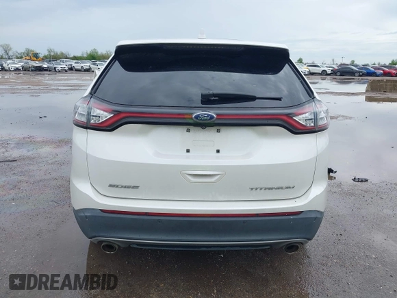 2015 Ford Edge Titanium z VIN 2FMTK3K82FBC42299, wystawiony jako IAAI lot #41912657 z przebiegiem 198 144 mil mil oraz . Historia ofert i sprzedaży dostępna na DreamBid. Obrazek 16.