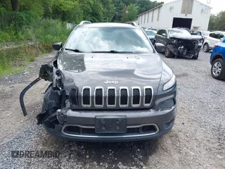 2014 Jeep Cherokee Limited with VIN 1C4PJMDB2EW216225, listed as a IAAI auction lot 42672551 with 151,799 mi miles and . Bid and sale history available at DreamBid. Image 12.
