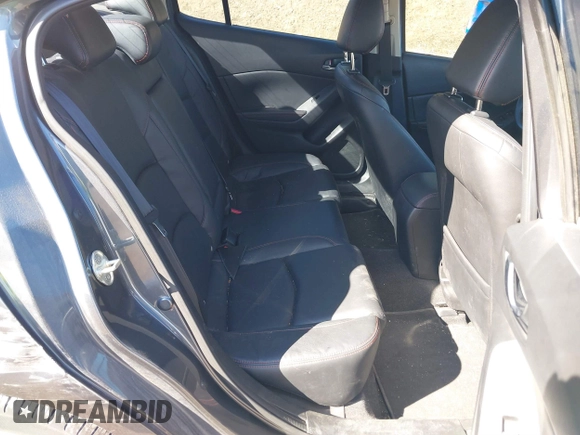 2014 Mazda 3 S Touring with VIN JM1BM1V37E1144331, listed as a IAAI auction lot 41880673 with 102,963 mi miles and . Bid and sale history available at DreamBid. Image 8.