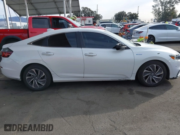 2021 Honda Insight Touring with VIN 19XZE4F97ME002699, listed as a IAAI auction lot 41397130 with 213,920 mi miles and . Bid and sale history available at carsss.com. Image 13.