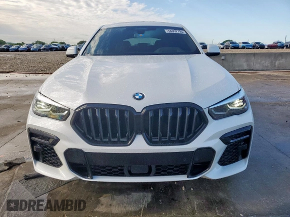 2023 BMW X6 xDrive40i z VIN 5UXCY6C08P9N43749, wystawiony jako Copart lot #54092795 z przebiegiem 39 495 mil mil oraz Szkody całkowita. Historia ofert i sprzedaży dostępna na DreamBid. Obrazek 5.