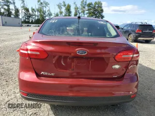 2015 Ford Focus SE with VIN 1FADP3F24FL386359, listed as a Copart auction lot 63519185 with 114,079 mi miles and Salvage title. Bid and sale history available at DreamBid. Image 6.