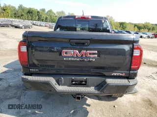 2024 GMC Canyon 4WD AT4 with VIN 1GTP6DEK2R1180037, listed as a Copart auction lot 71637264 with 7,565 mi miles and Salvage Title. Bid and sale history available at carsss.com. Image 6.