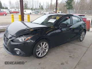 2014 Mazda 3 S Grand Touring with VIN JM1BM1M31E1150126, listed as a IAAI auction lot 41813519 with 103,578 mi miles and . Bid and sale history available at DreamBid. Image 2.