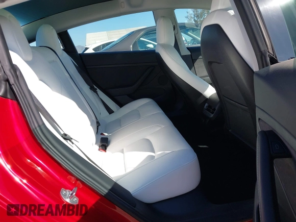 2021 Tesla Model 3 Long Range with VIN 5YJ3E1EBXMF990242, listed as a IAAI auction lot 41674222 with 24,554 mi miles and . Bid and sale history available at DreamBid. Image 8.