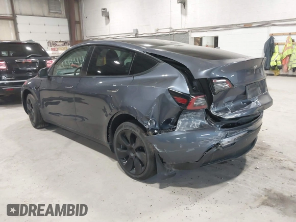 2023 Tesla Model Y Long Range with VIN 7SAYGAEE2PF755674, listed as a IAAI auction lot 41890025 with 24,783 mi miles and . Bid and sale history available at DreamBid. Image 3.