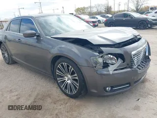 2013 Chrysler 300 with VIN 2C3CCABG7DH611105, listed as a IAAI auction lot 41769860 with 186,476 mi miles. Bid and sale history available at carsss.com. Image 1.