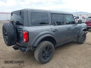 2021 Ford Bronco with VIN 1FMEE5BH0MLA74753, listed as a IAAI auction lot 42520641 with 66,326 mi miles and . Bid and sale history available at DreamBid. Image 4.