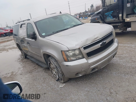 2009 Chevrolet Suburban LT with VIN 1GNFK16309R259972, listed as a IAAI auction lot 41568798 with 327,218 mi miles. Bid and sale history available at carsss.com. Image 1.