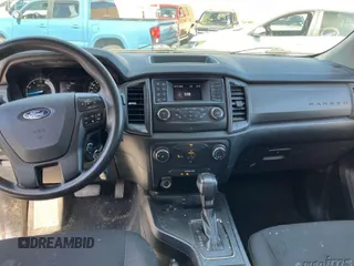 2020 Ford Ranger XL with VIN 1FTER1EH3LLA36297, listed as a IAAI auction lot 42001755 with 89,249 mi miles. Bid and sale history available at carsss.com. Image 1.