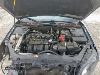 2012 Ford Fusion SE z VIN 3FAHP0HA7CR234996, wystawiony jako Copart lot #59365175 z przebiegiem 117 769 mil mil oraz Szkoda całkowita • Salvage title. Historia ofert i sprzedaży dostępna na DreamBid. Obrazek 11.